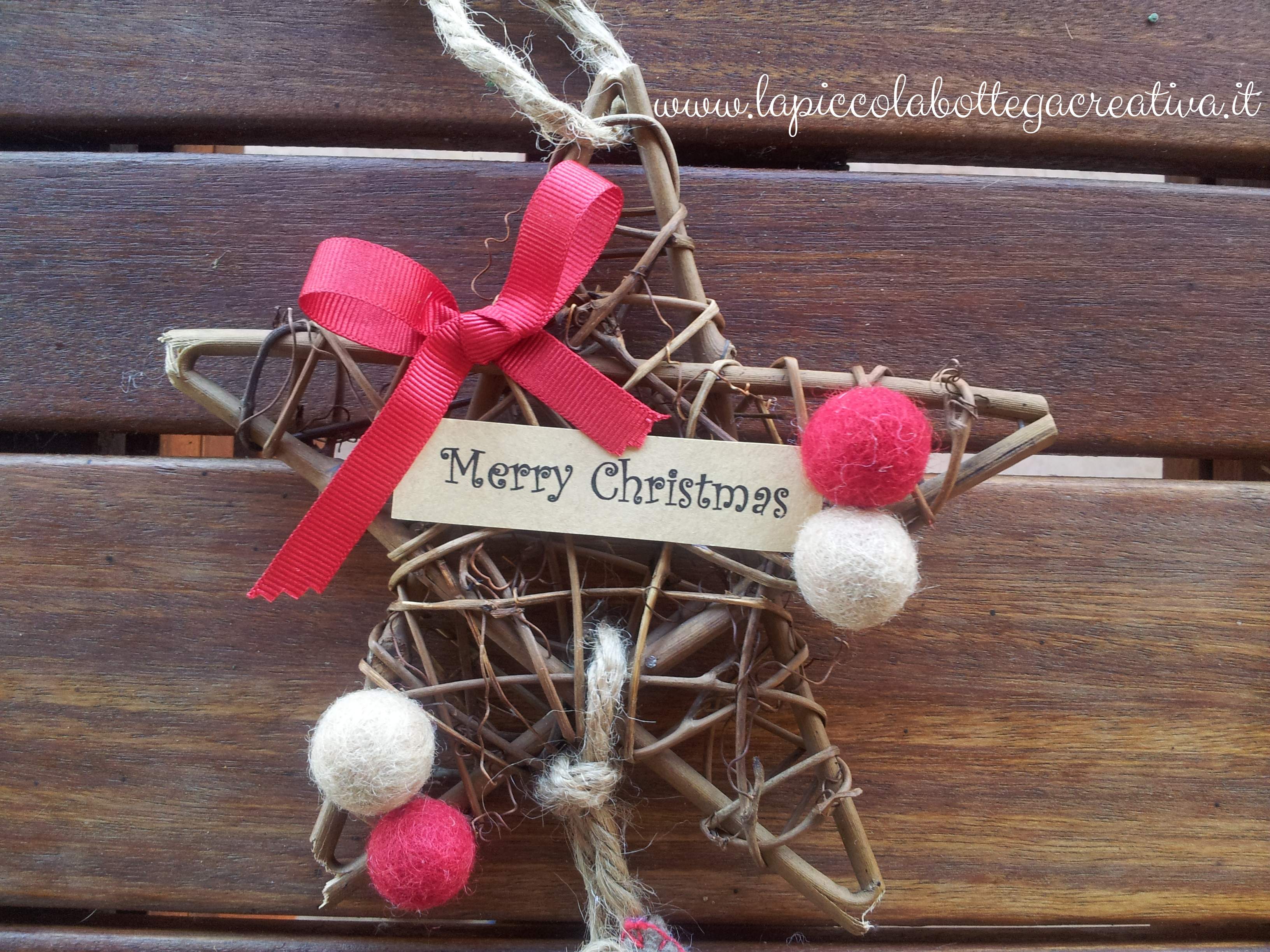 Stella legno natalizia decorata in feltro